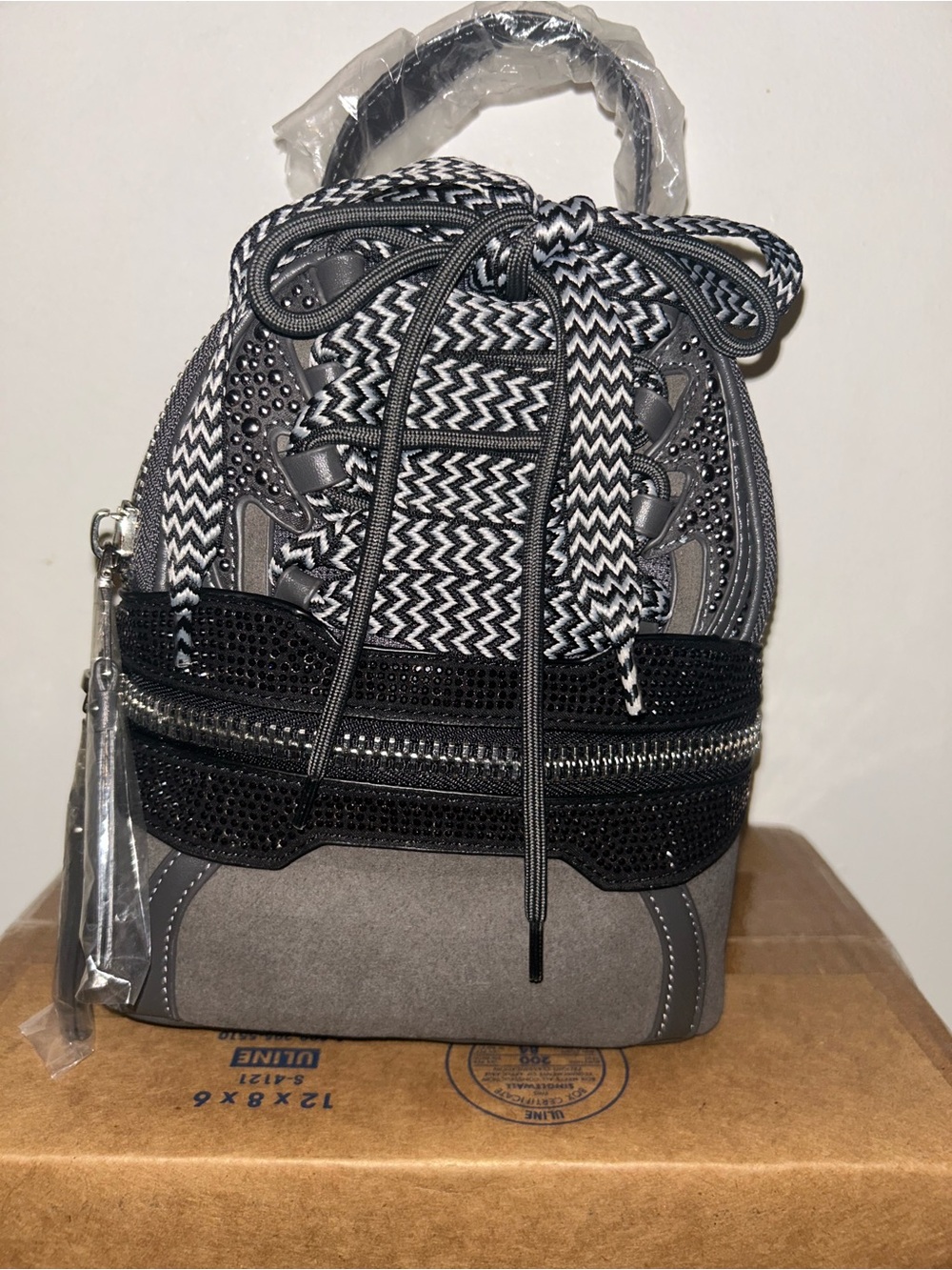Black and Gray Steve Madden Broaring backpack NWOT